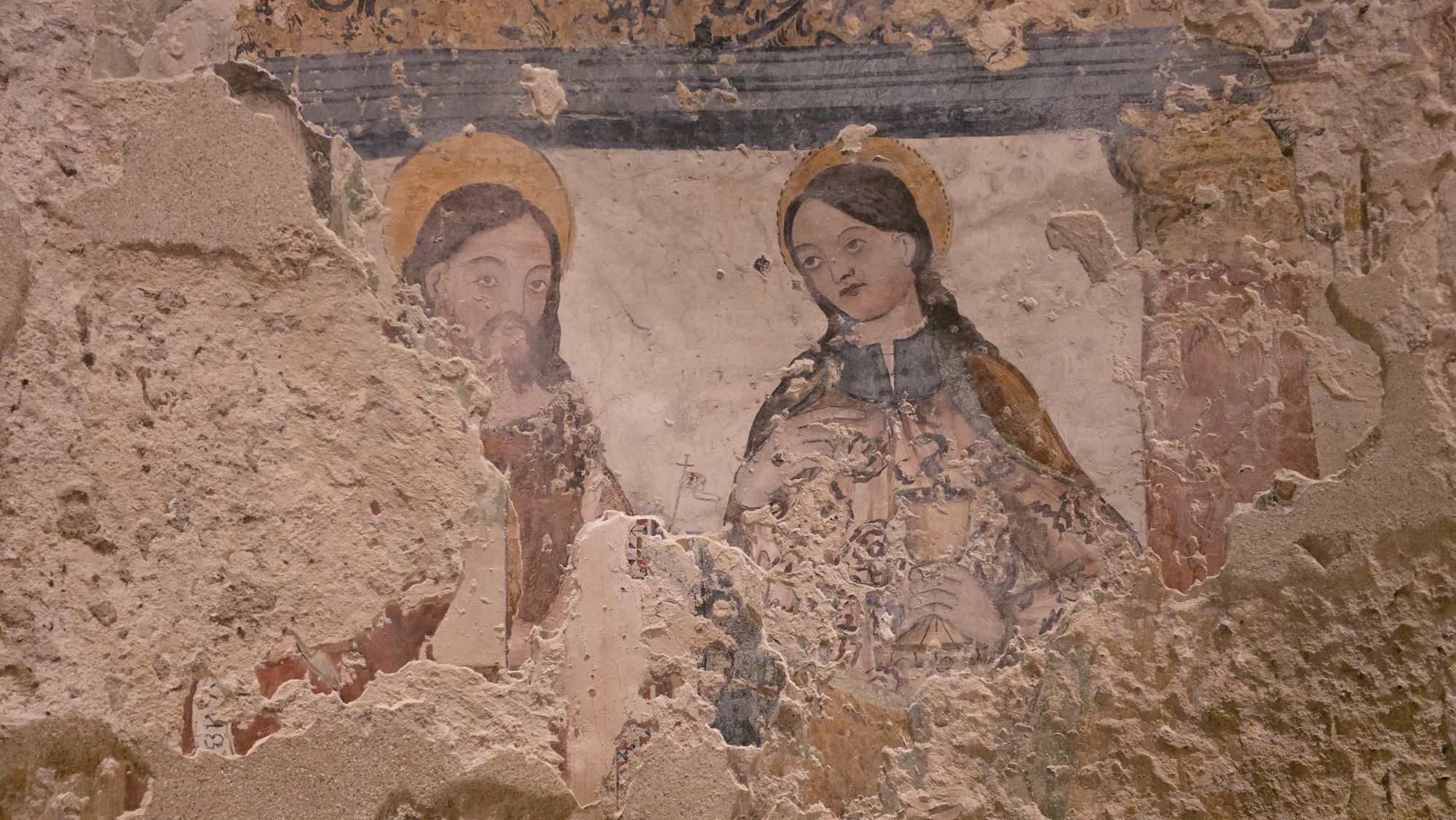Historische Freske in einer Felsenkirche von Matera